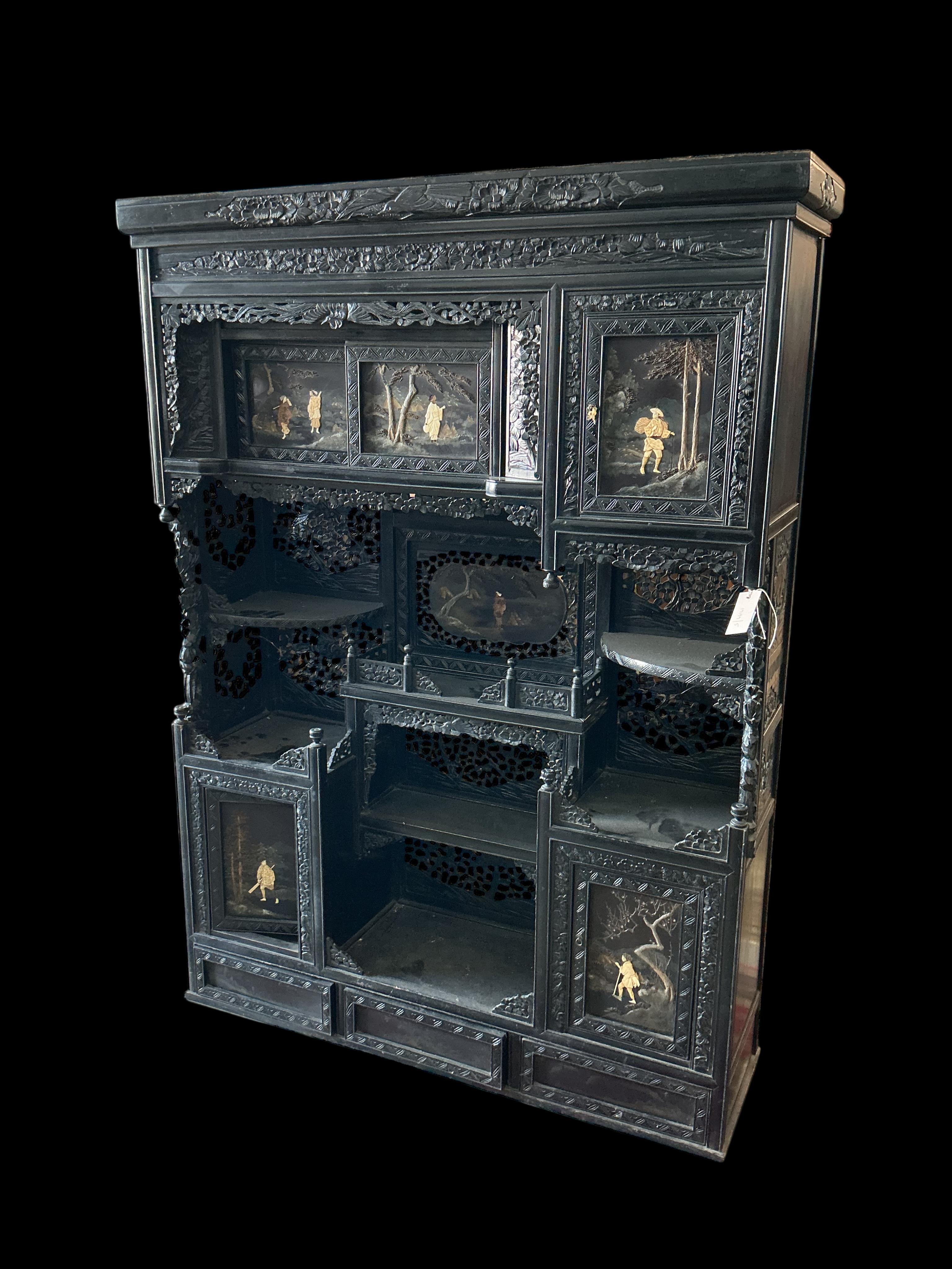 A Japanese Meiji period ebonised cabinet, width 110cm, depth 32cm, height 150cm CITES Submission reference Q4A31H9Q